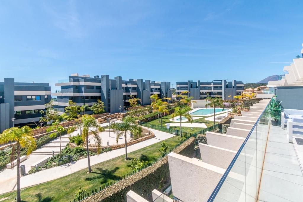 Swimming pools and garden of oasis 325 estepona